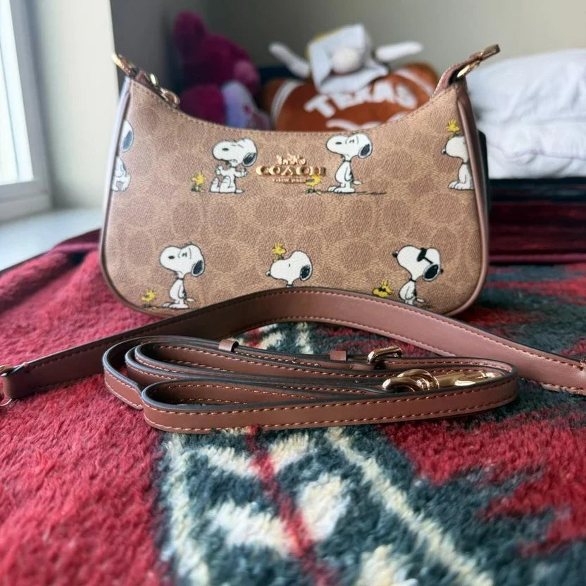 3. Coach Teri Shoulder Bag x Peanuts Snoopy Signature Canvas